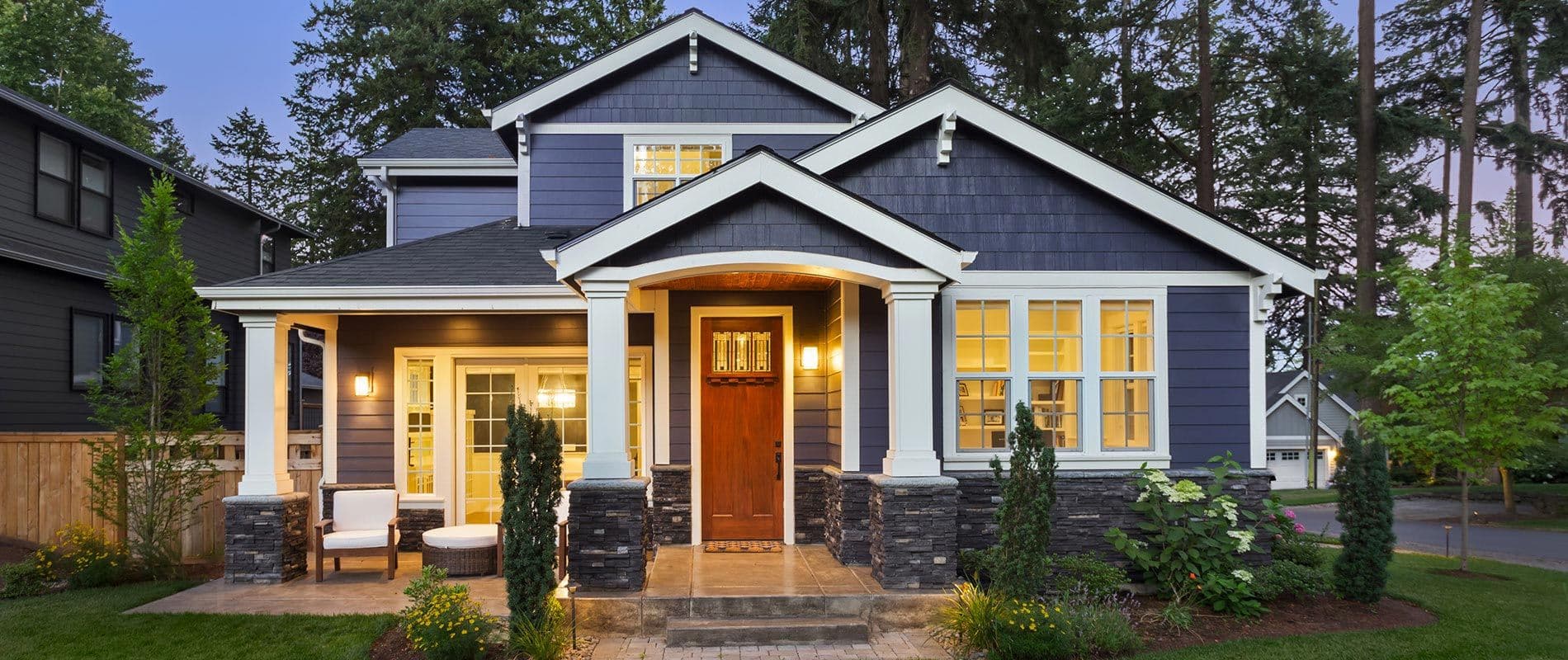 Replacement windows - home with blue siding